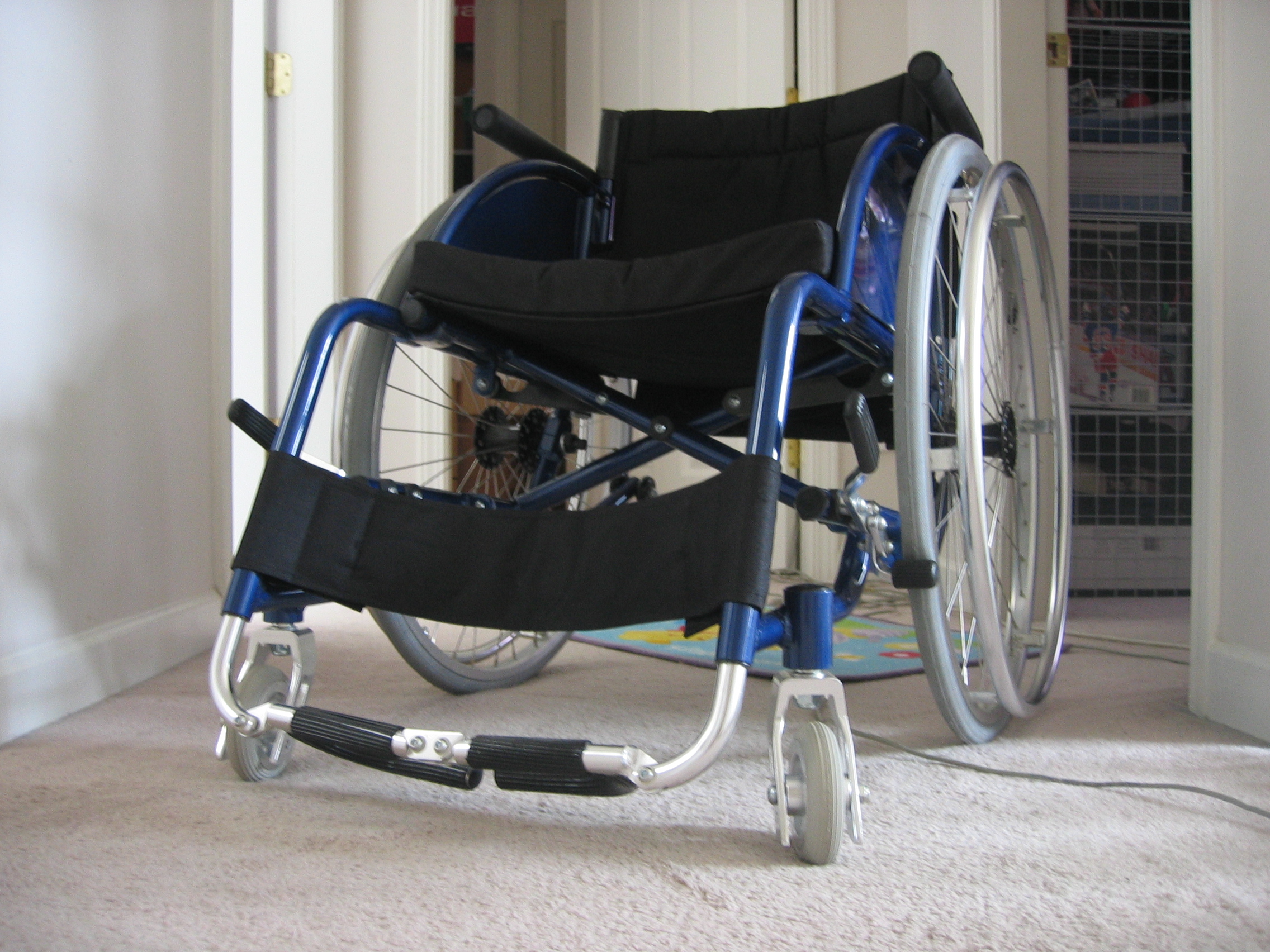 Blue folding wheelchair